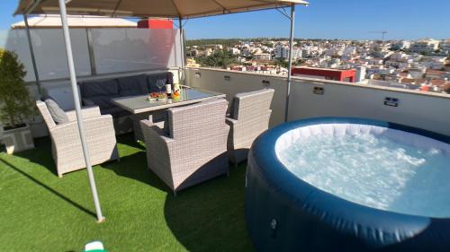 Ferragudo Apartment | Modern Apartment Beta with Rooftop Hot Tub and Ocean View