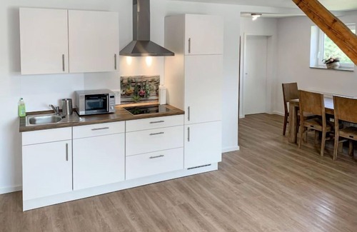 Holtriem Apartment | Oceanfront Escape at Apartment Borkum with Spa & Views