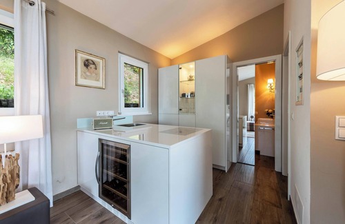 Gargnano Apartment | Experience "Casa 50": Garden Oasis with Shared Pool