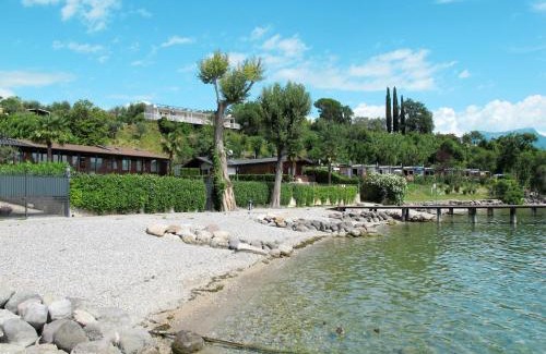Villaggio Sanghen Apartment | Cozy Apartment Casa Centrale with Pool & Ocean View