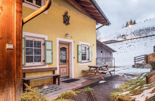 Vigo di Fassa Apartment | Discover 'Casa Delmarco': Private Terrace & Garden Oasis