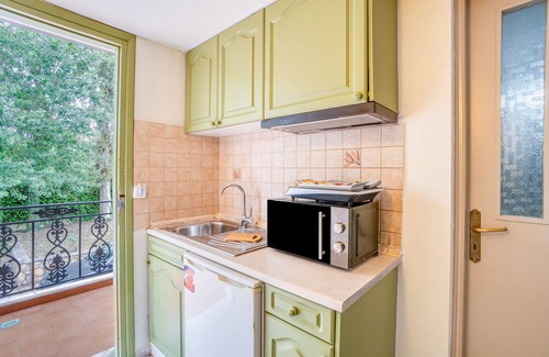 Limni House | Apartment 'Corfu Club Maisonette 2' with Shared Pool, Wi-Fi and Air Conditioning