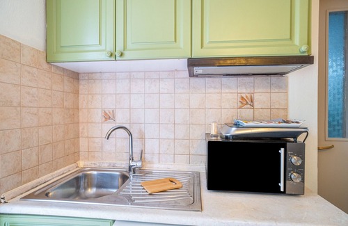 Limni House | Apartment 'Corfu Club Maisonette 2' with Shared Pool, Wi-Fi and Air Conditioning