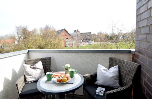 Wurster Nordseekuste Apartment | Apartment de Hasel with dike view, beach chair, 4 star rating (DTV)