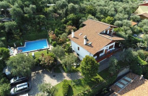 Magugnago Apartment | Family-Friendly Apartment Delvai-2 with Pool Access