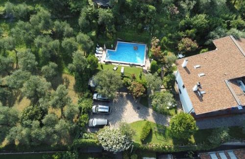 Magugnago Apartment | Family-Friendly Apartment Delvai-3 with Pool Access