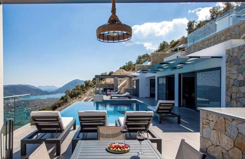 Nidri Apartment | Desun Suites Golden: Sea View, Pool & Wi-Fi Getaway