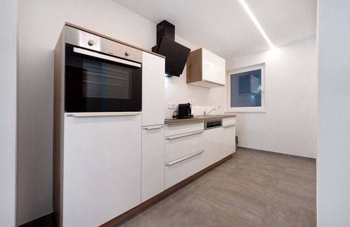 Fortezza Apartment | Dinaro Suite - Mountain View, Sauna & Private Terrace Escape