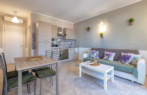 Trinita d'Agultu Apartment | Apartment 'Dolce Vita' with Sea View, Shared Pool and Wi-Fi