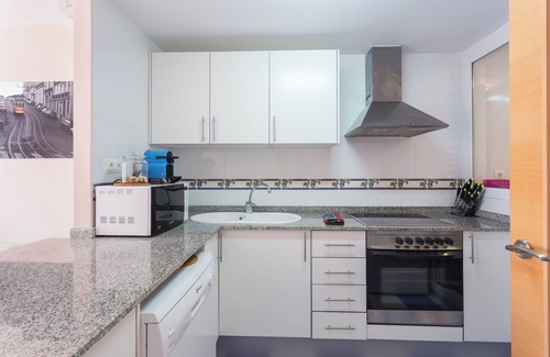 Les Deveses Apartment | Apartment 'Entre Olas 2' with Shared Pool, Private Terrace and Air Conditioning