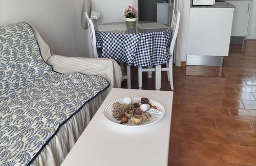 Arenal d'en Castell Apartment | Cozy Beachfront Apartment with Stunning Ocean Views