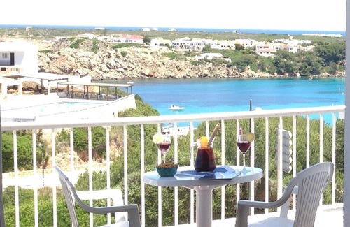Arenal d'en Castell Apartment | Cozy Beachfront Apartment with Stunning Ocean Views