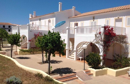 Arenal d'en Castell Apartment | Cozy Beachfront Apartment with Stunning Ocean Views