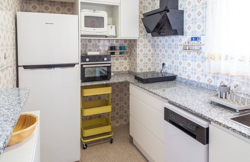 Els Arenals del Sol Apartment | Beachfront Apartment with Pool, Gym & Parking Available