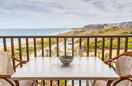 Els Arenals del Sol Apartment | Beachfront Apartment with Pool, Gym & Parking Available