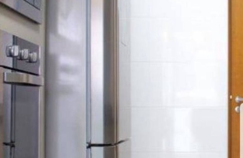 Praia Grande Apartment | Seaside Apartment with Pool - Perfect Location for Families