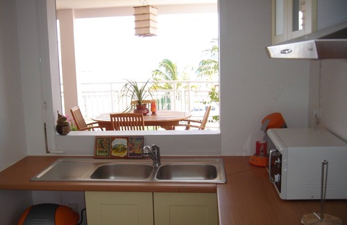 Le Carbet Apartment | Oceanfront Apartment: Relaxing Getaway with Pool & Spa