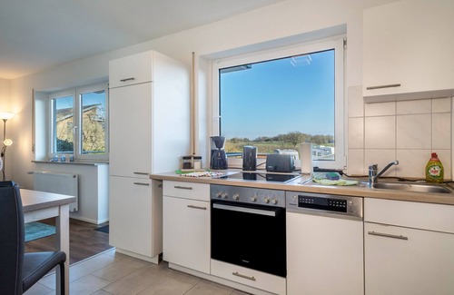 Schnetzenhausen Apartment | Relaxing Stay at Ferien am See 3 with Oceanfront Amenities