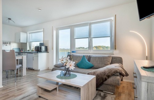 Schnetzenhausen Apartment | Relaxing Apartment "Ferien am See 8" with Garden & Wi-Fi