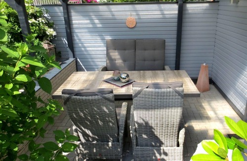Wolfshagen Apartment | Spacious Living Room with Kitchen and Accessibility Features