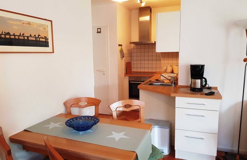Neuensien Apartment | Discover Ocean View Apartment Fischerhaus with Winter Garden