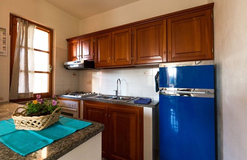 Agrustos Apartment | Oceanfront Apartment in Budoni with Pool & Pet-Friendly Amenities
