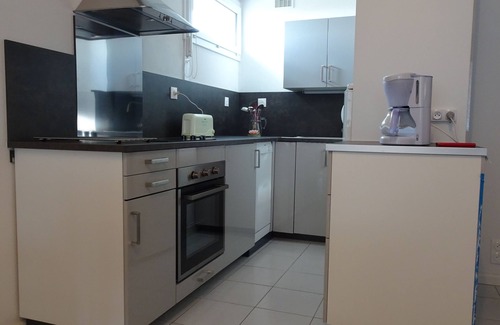 Courseulles-sur-Mer Apartment | Oceanfront Apartment for 6 with Pool & Breakfast Included