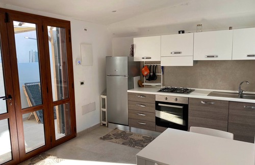 Budoni Apartment | Apartment 'Giardinelli' with Private Garden, Wi-Fi and Air Conditioning