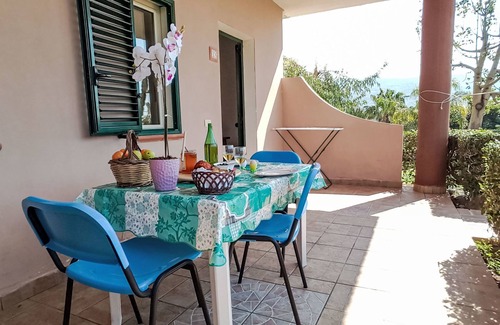 Ricadi Apartment | Oceanfront Apartment Heaven: Pet Friendly & Spa Amenities