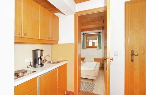 Sankt Johann in Tirol Apartment | Apartment in St. Johann in Tyrol with a garden
