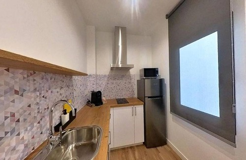 Puerto del Rosario Apartment | Cozy Yellow Apartment in Puerto del Rosario Awaits You