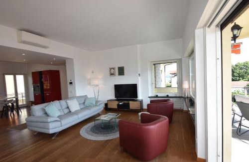 Verbania House | Scenic Lakefront Retreat with Panoramic Balconies