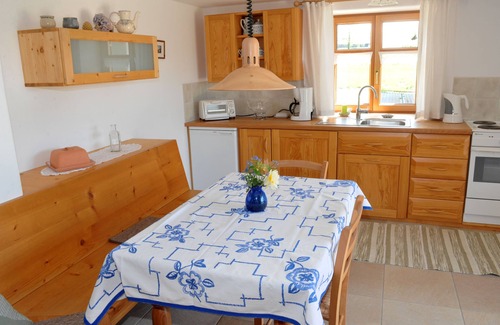 Maierhofen Apartment | Scenic Apartment Overlooking Nature with Pool & Ocean View