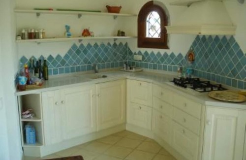 San Teodoro Villa | Seaside Apartment with Gorgeous Garden and Ocean View
