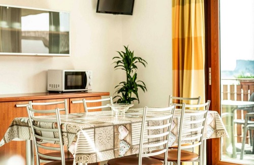 Manerba del Garda Apartment | Pet-Friendly Apartment in Manerba with Pool & Barbecue