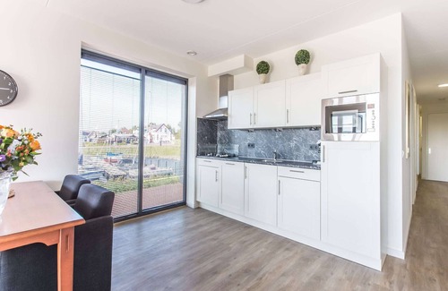 Kamperland Apartment | Elegant Apartment with Marina View & Pet-Friendly Amenities