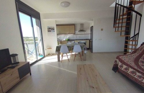 Sant Carles de la Rapita Apartment | Relaxing Apartment in La Ràpita with Oceanfront Pool