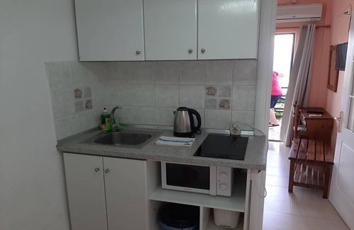 Dafnata Apartment | Inviting Mpenitses Apartment with Shared Pool & Pet-Friendly