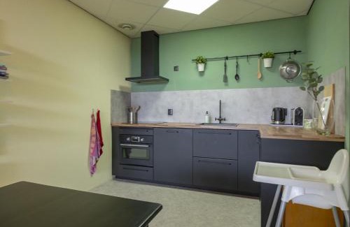 Julianadorp aan zee Apartment | Cozy Apartment with Garden Steps from the North Sea