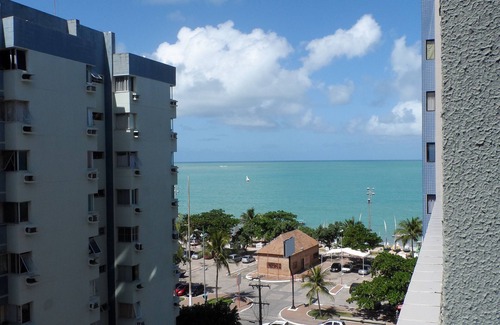 Pajucara Apartment | ```html
Prime Apartment Steps from Pajuçara Beach with Ocean View
```