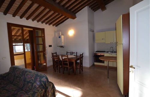 Campiglia Marittima Apartment | Cozy Apartment with Garden Steps from the Ocean