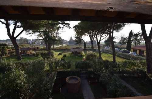 Campiglia Marittima Apartment | Cozy Apartment with Garden Steps from the Ocean