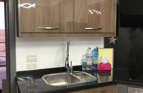 Ras Nasrani Apartment | Elegant Apartment in Residence Sunny Beach Montazah with Pool