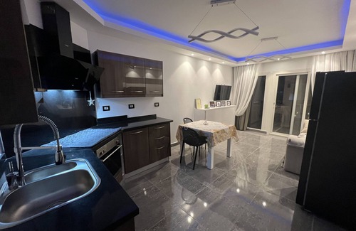 Ras Nasrani Apartment | Elegant Apartment in Residence Sunny Beach Montazah with Pool