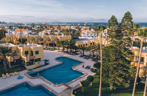 Corralejo Apartment | Cozy Apartment in Resort with Pool and Ocean View