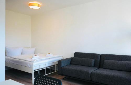 Wolfsburg Apartment | Cozy Apartment with Balcony in Serene Location