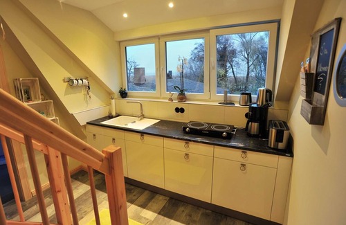 Vogelsang-Warsin Apartment | Cozy Apartment in the Old Captain's House with Ocean View