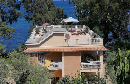 Cefalu Coast Apartment | Cozy Apartment Steps from the Sea with Family-Friendly Perks