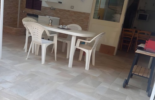 Lido Conchiglie Apartment | Apartment 'Blu' with Private Terrace, Private Garden and Air Conditioning