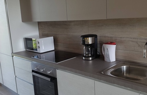 Desenzano del Garda Apartment | Experience Apartment Esmera: 2 Rooms, Pool & Ocean Views